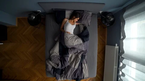 Image from above of man bringing breakfast to the girlfriend at bed. Stock Footage 119222964
