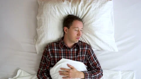 Image from above of your man waking up during morning. Video stock 132182657