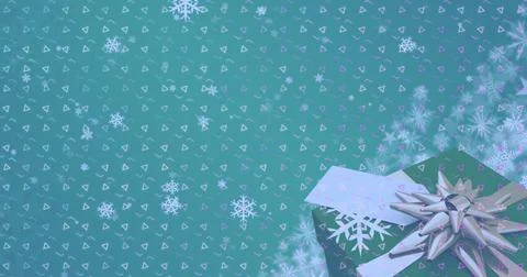 Image of abstract pattern design over snowflakes falling against close up of Stock Photos