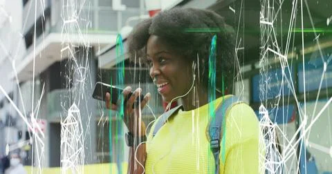 Image of abstract pattern over african american woman talking on phone wear.. Stock Photos