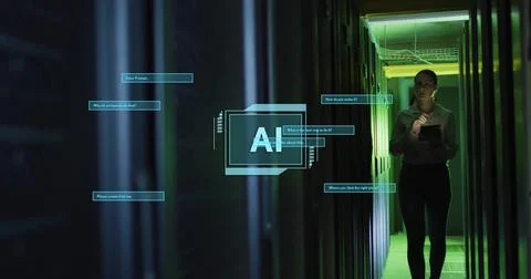 Image of ai text, data processing over caucasian female engineer by computer Foto stock