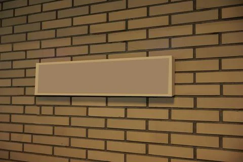 Image of the announcement panel placed on the stone wall. Stock Photos