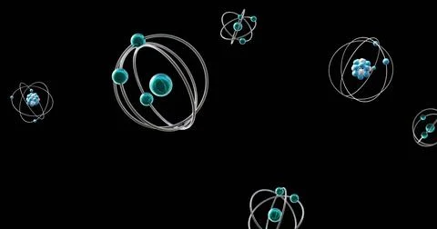 Image of atom models spinning on black background 写真素材
