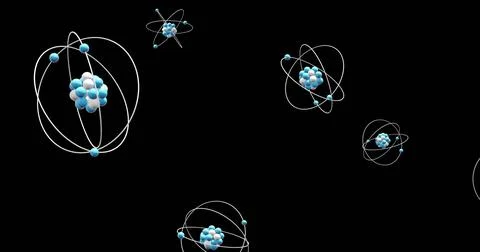 Image of atom models spinning on black background 스톡 사진