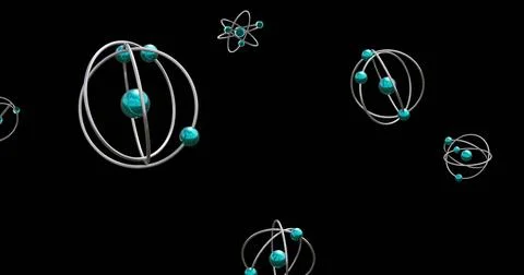 Image of atom models spinning on black background 写真素材