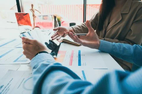 Image of Audit team working together and looking about transaction for Stock Photos