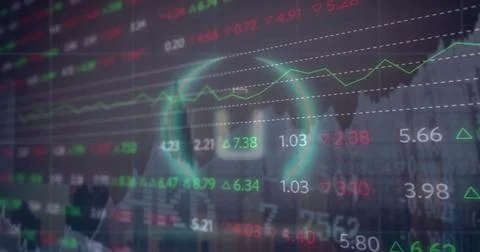 Image of battery icon in circle over multiple graphs and trading board against Stock Photos