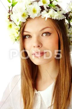 Image of beautiful female wearing floral wreath on head Stock Photos