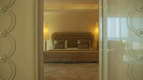 Image of bedroom with light beside them in a luxury hotel room. Stock Footage 125504700