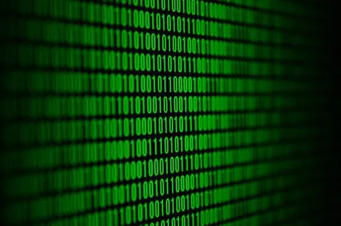 An image of a binary code made up of a set of green digits on a black backgro 写真素材