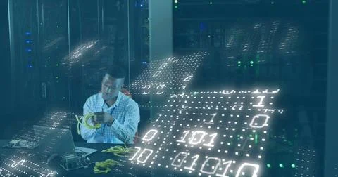 Image of binary codes, african american man feeding cable details in laptop at Stock Photos