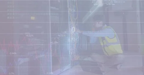 Image of binary codes and programming language, caucasian man checking data 库存照片