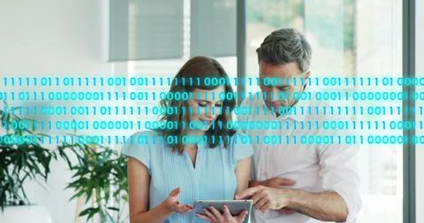 Image of binary codes over caucasian coworkers discussing reports on digital Stock Photos