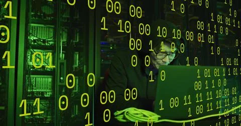 Image of binary coding and data processing over asian male hacker by computer Foto stock