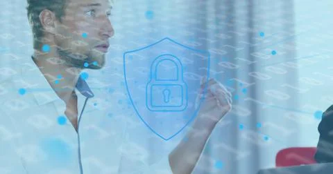 Image of binary coding and padlock security interface with businessman in 库存照片