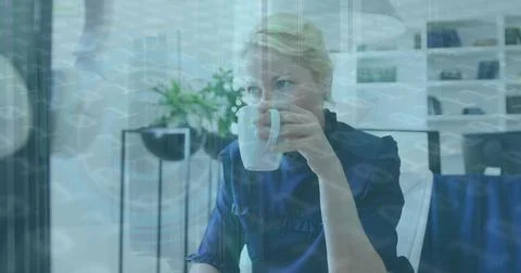 Image of binary coding data processing over woman drinking coffee at home Stock Photos