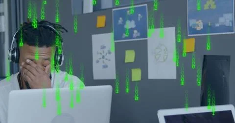 Image of binary coding data processing over african american businessman in Stock Photos