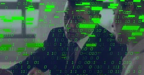 Image of binary coding data processing over diverse business people in office Foto stock