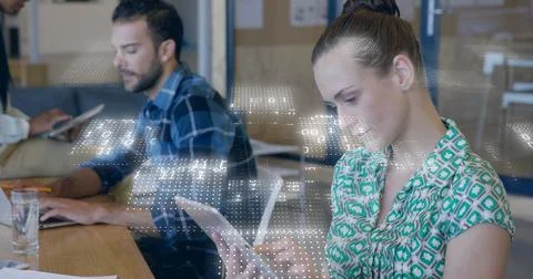 Image of binary coding data processing over diverse business people in office Stock Photos