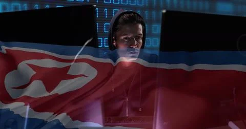 Image of binary coding with hacker over flag of north korea Stock Photos