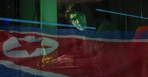 Image of binary coding with hacker over flag of north korea Stock Photos