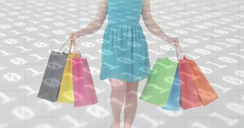 Image of binary coding numbers changing over woman holding shopping bags 写真素材