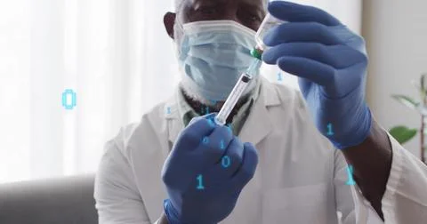Image of binary coding over african american male doctor preparing vaccine 库存照片