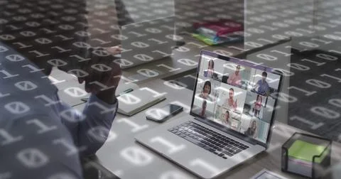 Image of binary coding over african american businessman having laptop image 库存照片