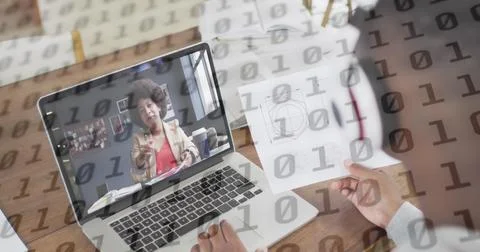 Image of binary coding over businessman with documents having image call Foto stock