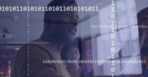 Image of binary coding over diverse colleagues discussing work in office Foto stock