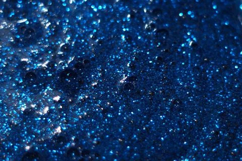 Image of blue glitter liquid with bubbles Stock Photos