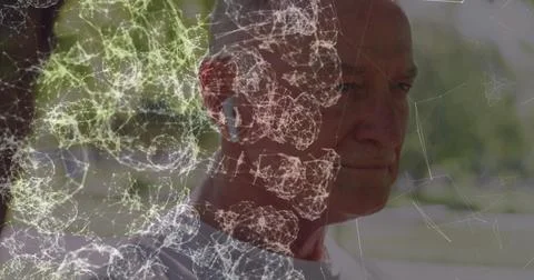 Image of blue hexagon pattern over connecting dots, caucasian mature man using Stock Photos