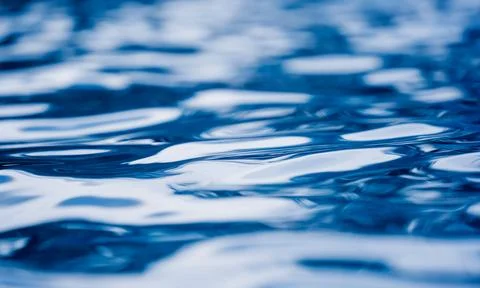 A image of blue ocean waves featuring a water surface in detail Stock Photos