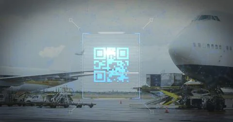 Image of a blue QR code over an airplane taking off Foto stock
