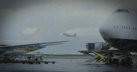 Image of a blue QR code over an airplane taking off Foto stock