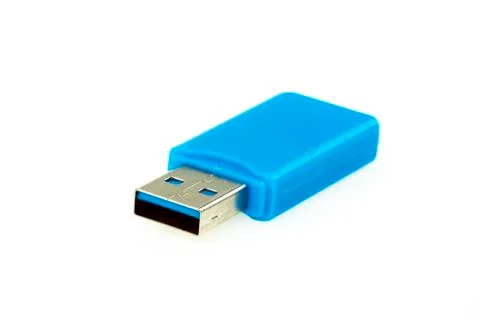 Image of blue USB flash drive isolated on white background. Computer hardware Stock Photos