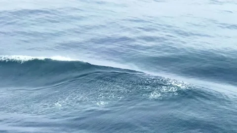 Image of blue waves, abstract background, 0.5x speed Video stock 329337646