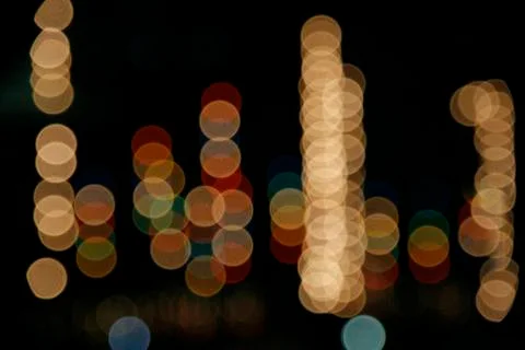 Image of blurred bokeh background with warm colorful lights. Abstract circula Foto stock