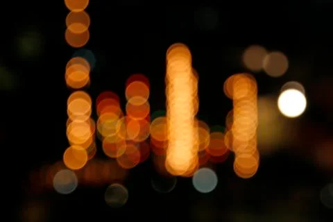 Image of blurred bokeh background with warm colorful lights. Abstract circula Stock Photos