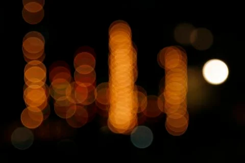 Image of blurred bokeh background with warm colorful lights. Abstract circula Stock Photos