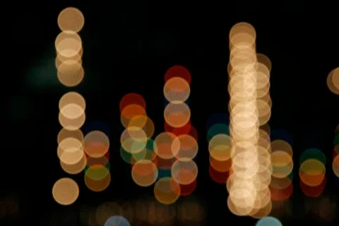 Image of blurred bokeh background with warm colorful lights. Abstract circula Stock Photos