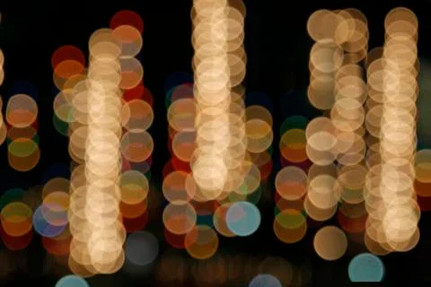 Image of blurred bokeh background with warm colorful lights. Abstract circula Stock Photos