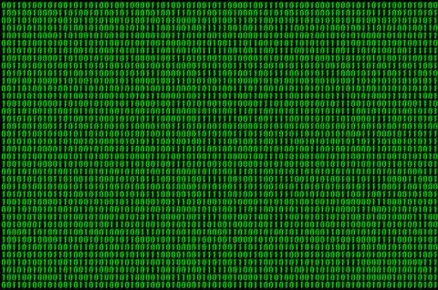 Image of a blurry binary code composed of a set of green numbers on a black b Foto stock