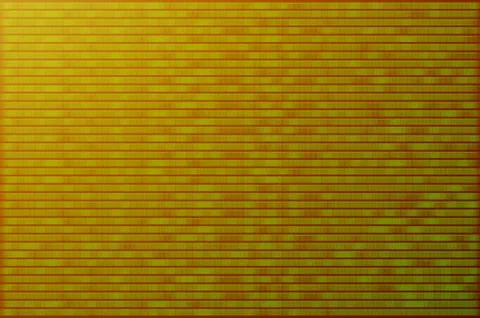 An image of a blurry binary code made up of a set of green numbers on a black 写真素材