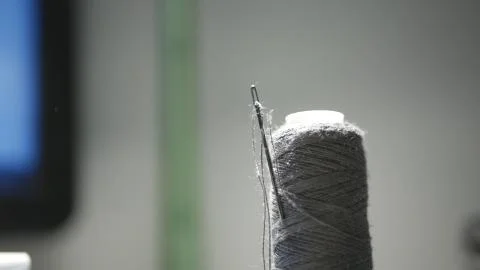Image with Bobbin with Needle and Thread Used in Tailoring Work 스톡 사진