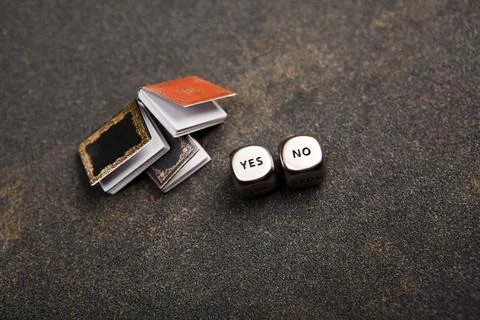 Image of book yes no cube Stock Photos