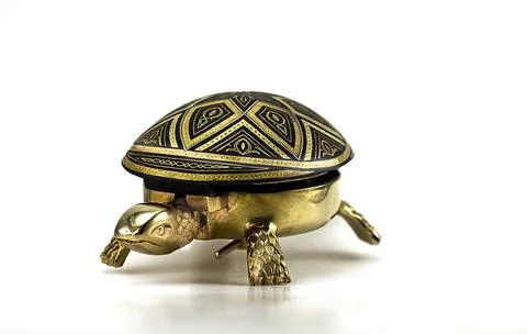 Image of  Brass Mechanical turtle bell Stock Photos