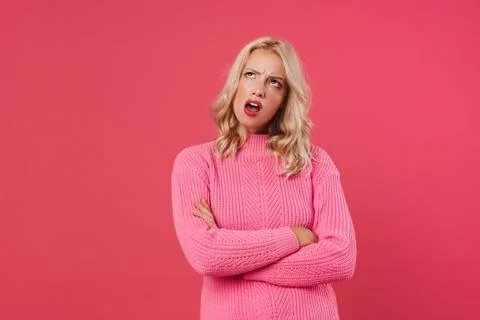 Image of brooding blonde girl posing and looking upward Stock Photos