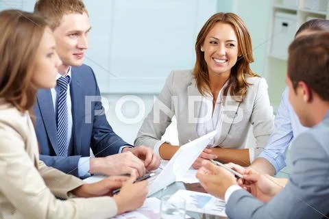 Image of business partners discussing plans at meeting Stock Photos