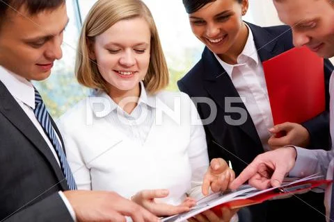 Image of business people planning work at meeting Stock Photos